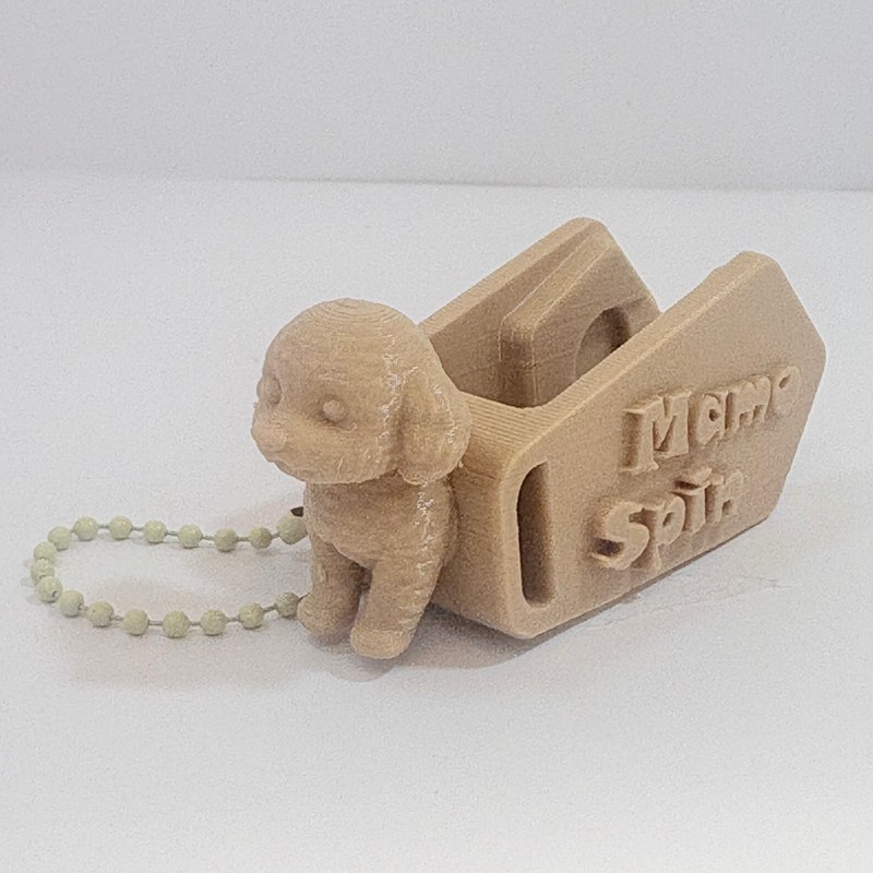 MamoSpin Léo — cachorrinho bege prendido no prendedor