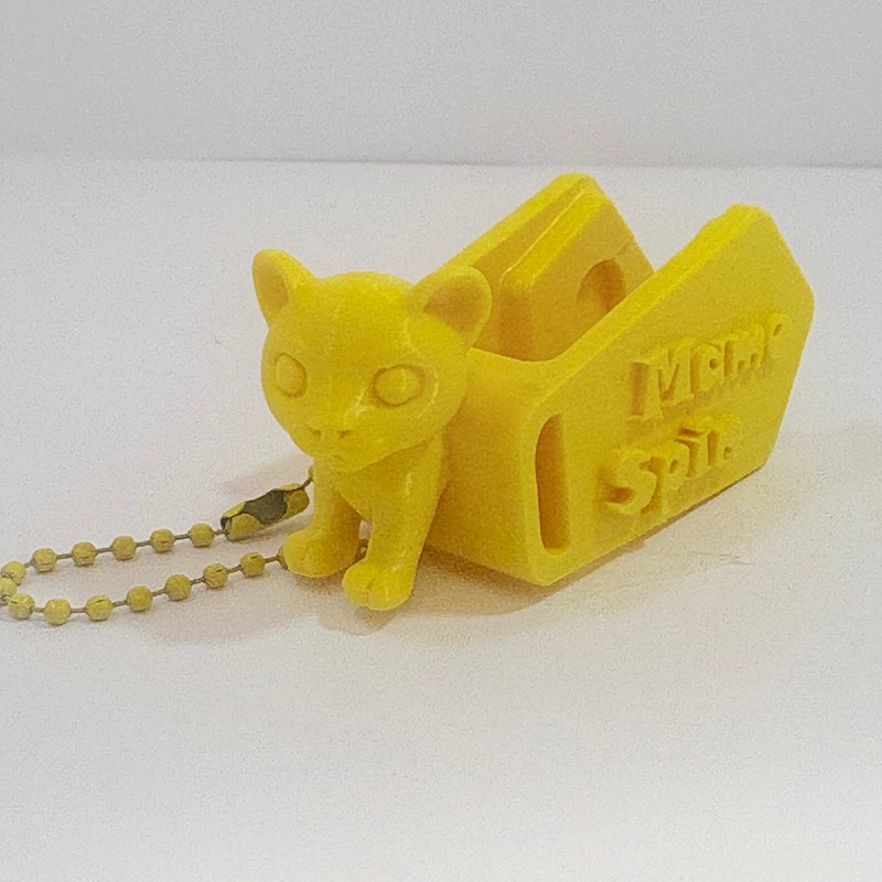 MamoSpin Zupi — leopardo amarelo de lado, mostrando o prendedor Mamo Spin